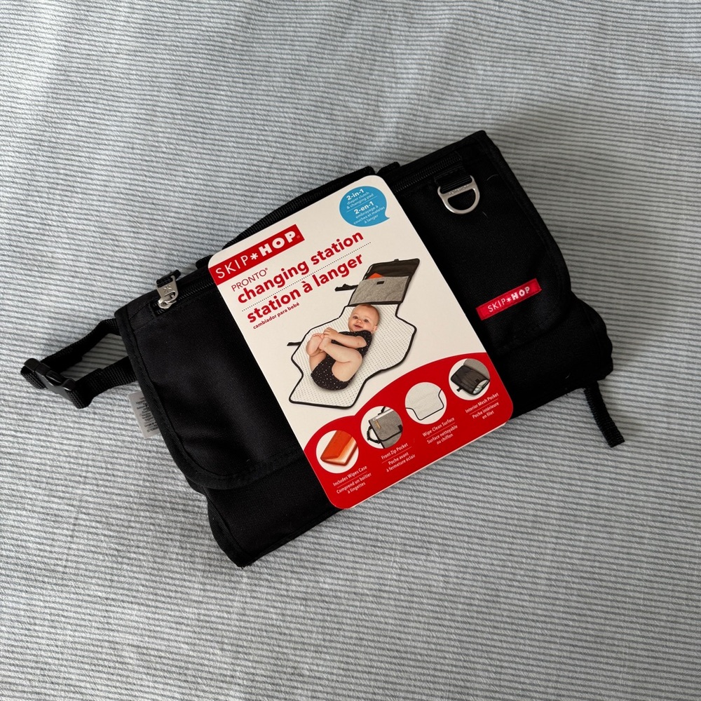 Brand new Skip Hop black portable diaper bag changing table bag